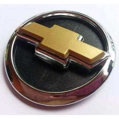 Emblema Gravata Dourada Grade Corsa 94 em diante (Não serve no Frente Montana)