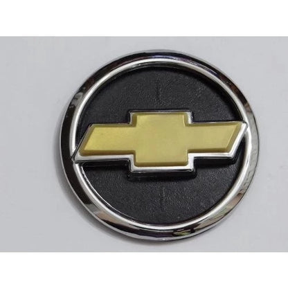 Emblema Gravata Dourada Grade Corsa 94 em diante (Não serve no Frente Montana)